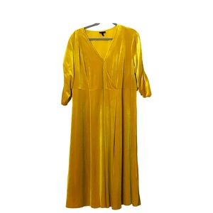 1X Plus Size Velvet Gold Faux Wrap Dress with ruched sleeves from Who What Wear.
